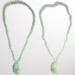 A group of jade bead necklaces