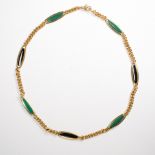 A malachite, onyx and eighteen karat gold chain necklace