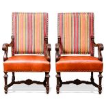 A pair of Spanish Barque style leather armchairs