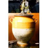 An urn form ceramic handled vase