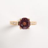 A pink spinel, diamond and eighteen karat gold ring