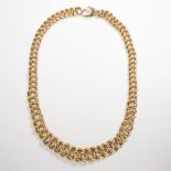 A fourteen karat gold curb link chain necklace