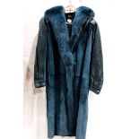 A turqoise Hettabetz Italian coat with mink collar