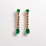 A pair of emerald, diamond and fourteen karat gold earrings