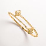 A yellow diamond and fourteen karat gold bracelet
