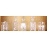 (lot of 5) Cut glass decanters and lidded jars