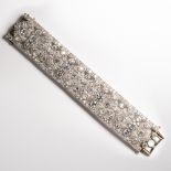 A French Art Deco diamond and platinum strap bracelet