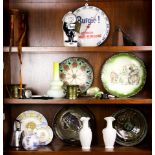 Three shelves of decorative items