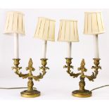 A pair of Louis XV style ormolu candelabra