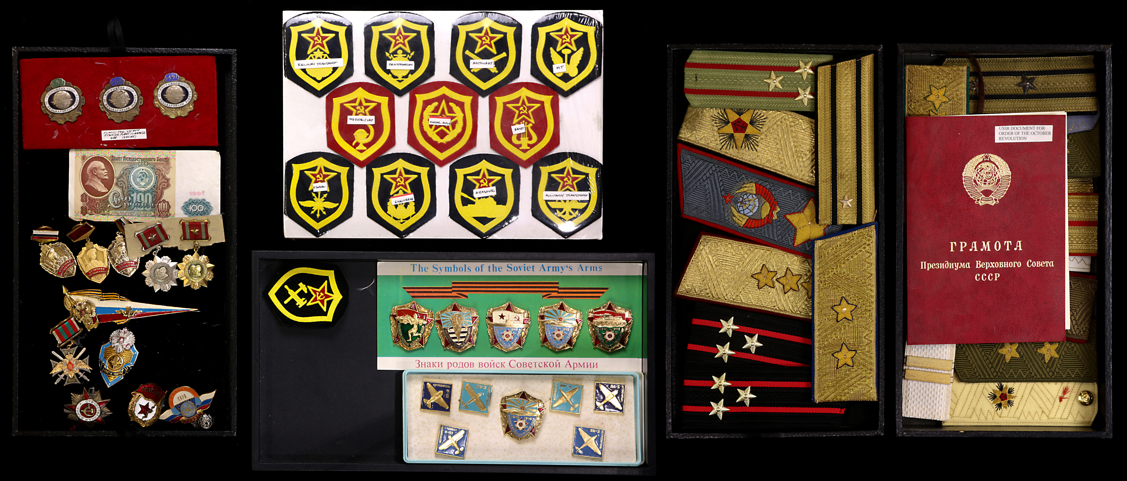 A collection of Russian and Bulgarian military badges and medals