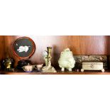 One shelf of Asian style decorative items