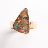 An opal and eighteen karat gold ring