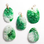 A group of jade pendants