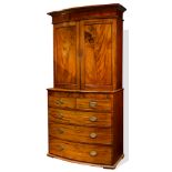 A Regency mahogany bow front cabinet circa 1820