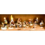 One shelf of Goebel figurines