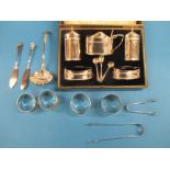 A boxed sterling silver cruet set Hallmarked 1910/11 and other silver items, approx total weight