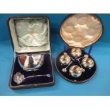 A boxed set of 4 silver salts and a boxed silver sugar bowl set, approx weight 294g