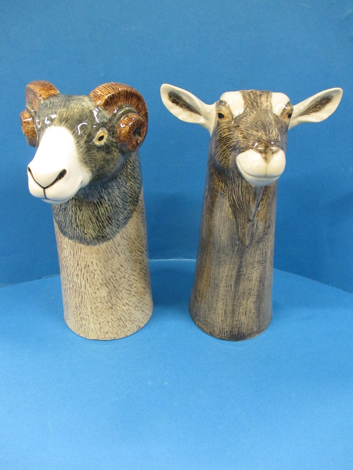 A pair of rare Quail pottery goat vases