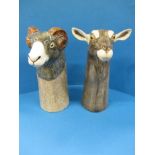 A pair of rare Quail pottery goat vases