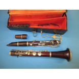 An antique clarinet by Jerome Thibouville Lamy in hard case