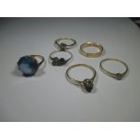 Six gold and yellow metal dress rings