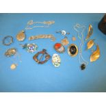 A quantity of vintage costume jewellery, to include some silver items