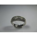 An 18ct ring set with 3 rows of various cut diamonds, approx finger size N