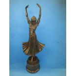 An Art Deco cast bronze figure after Chiparus