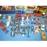 A quantity of vintage die-cast model vehicles to include racing cars