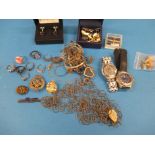 A quantity of interesting items to include rings, watches and a Bentley badge