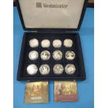 A cased set of 12 sterling silver proof 5 pound coins commemorating Nelson