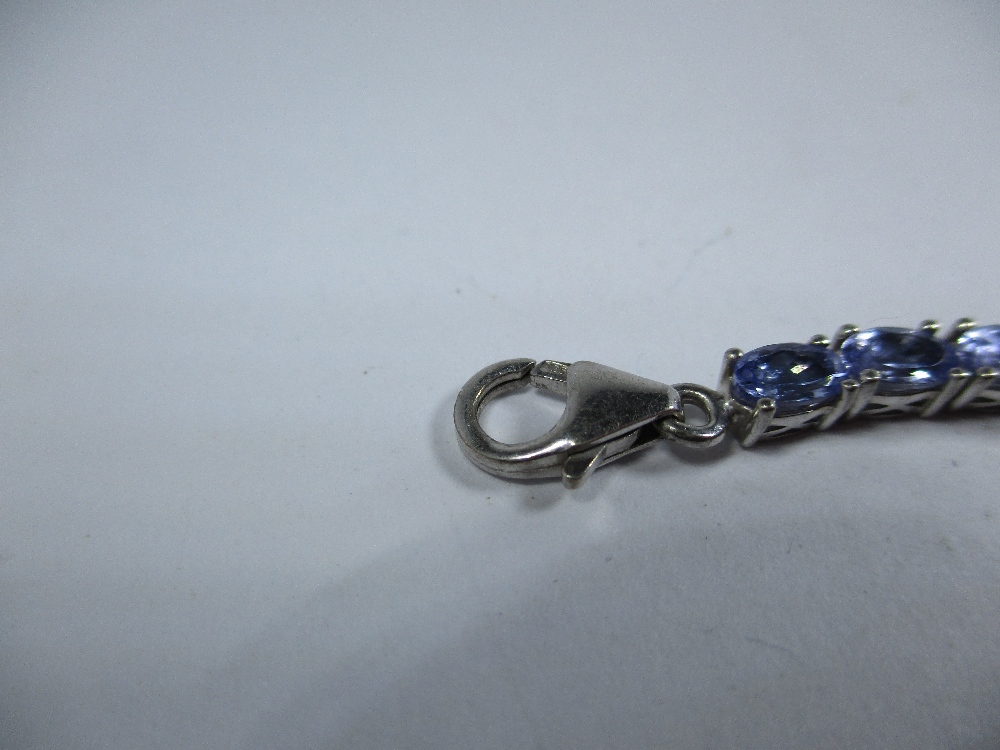 A silver and Tanzanite bracelet with matching ring and earrings - Image 5 of 6