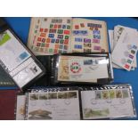 A quantity of stamp albums and first day covers