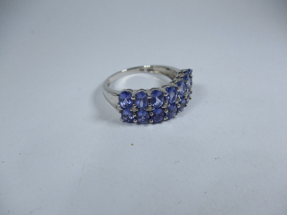 A silver and Tanzanite bracelet with matching ring and earrings - Image 3 of 6