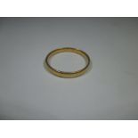 A 22ct gold wedding band, approx weight 2.8g