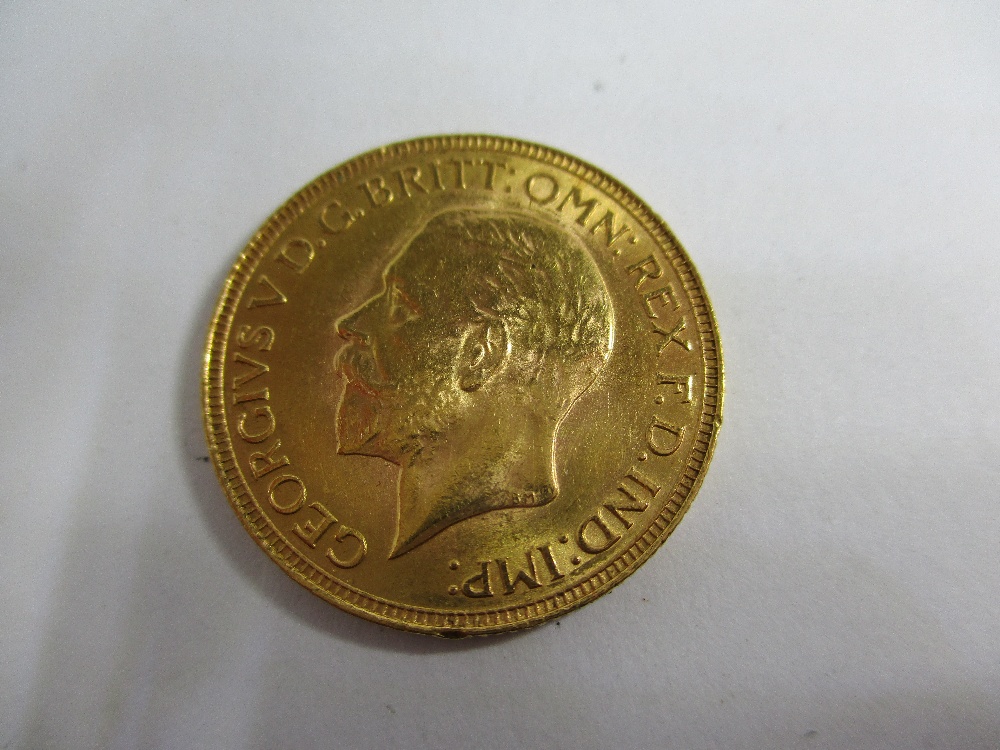 A 1930 George V gold full sovereign in a good grade - Image 2 of 8