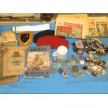 A quantity of military items to include medals, badges, patches and ephemera