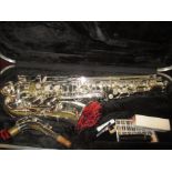 A Trevor James Revolution II saxophone in hard case, serial number T6122