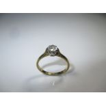 An 18ct yellow gold diamond solitaire ring, approx finger size O1/2