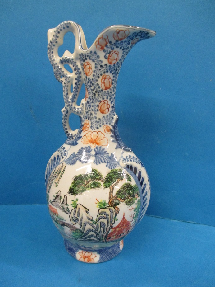 A Japanese hand-painted polychrome decorated sake jug