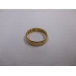 A small 22ct gold wedding band, approx weight 2.7g