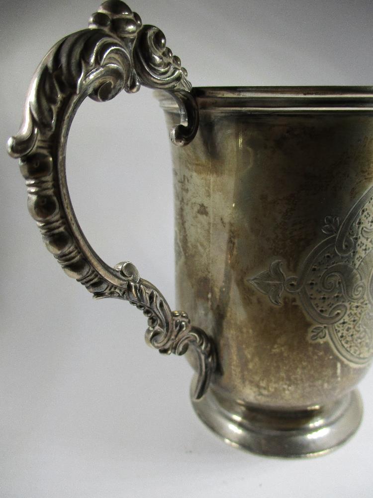 A Victorian silver mug and a silver napkin ring - Image 5 of 10