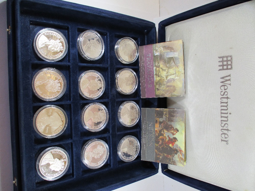 A cased set of 12 sterling silver proof 5 pound coins commemorating Nelson - Image 8 of 9