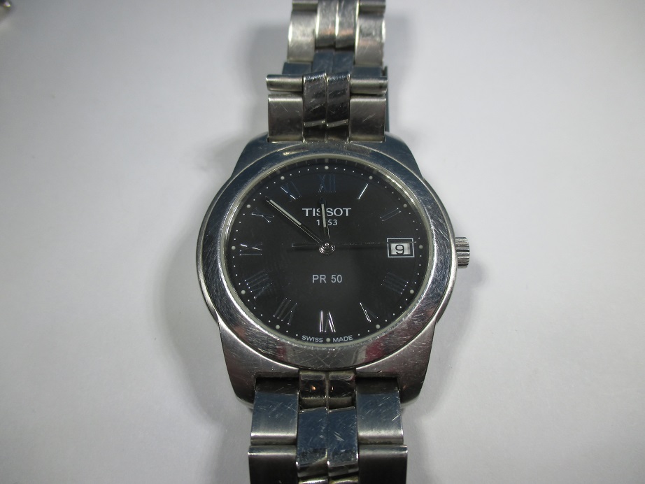 A vintage gents Tissot watch