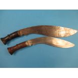 Two large WWI kukri one with a sun star mark to hilt