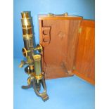 A vintage Aylward microscope in wood case