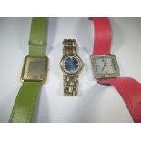 Two vintage Raymond Weil watches and a Swarovski example