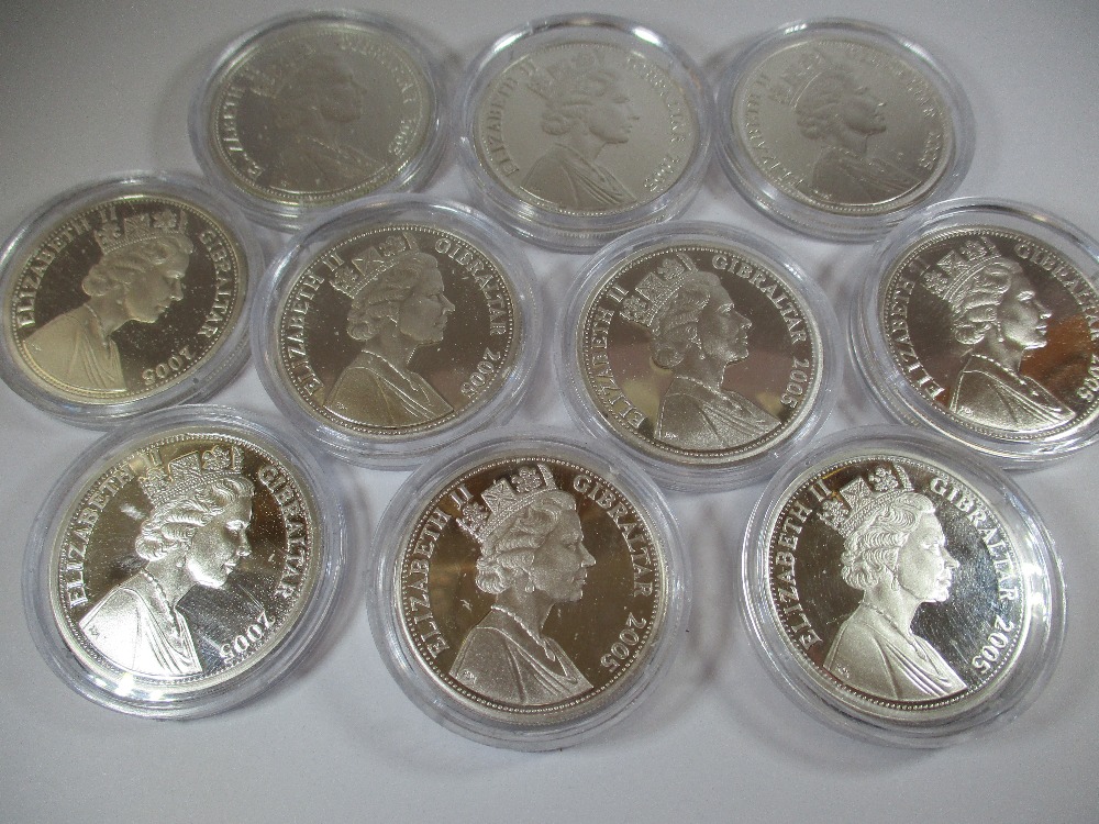 A cased set of 12 sterling silver proof 5 pound coins commemorating Nelson - Image 5 of 9