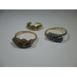 Three gold rings, two marked 18ct and one 15ct, approx weight 6.1g