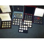 A large quantity of commemorative coins in cases